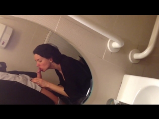 wife gives blowjob in the public toilet